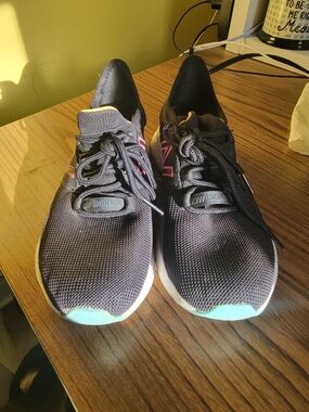 New Balance Men’s Black Knit Athletic Sneakers with Pink and Teal Accents